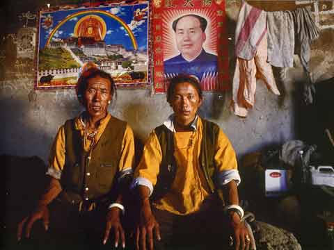 
Father And Son With Posters Of Mao And Potala Palace And Jowo Shakyamuni - Buddhism: Eight Steps To Happiness by Dieter Glogowski book
